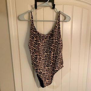 One piece Leopard swimsuit. Never worn. Size 10, Australian.